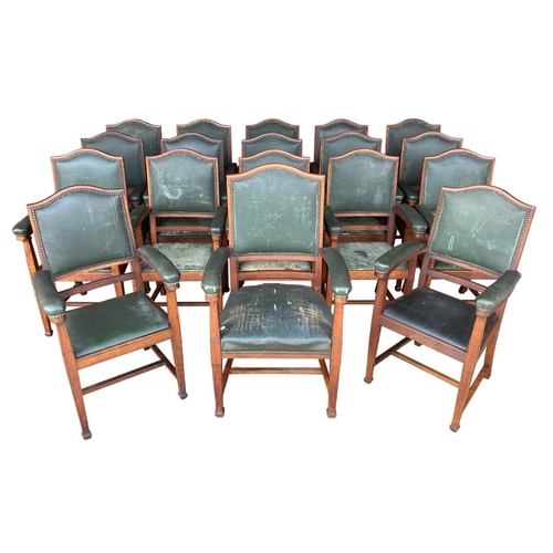 93 - A set of eighteen Arts and Crafts oak library chairs, made by Chamberlain, King & Jones Ltd.