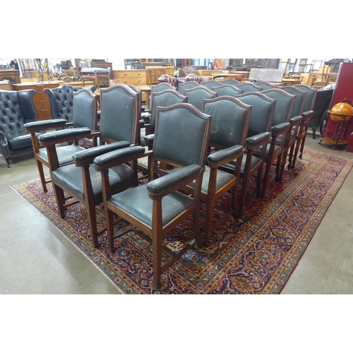 93 - A set of eighteen Arts and Crafts oak library chairs, made by Chamberlain, King & Jones Ltd.