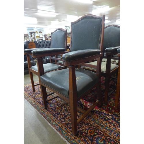 93 - A set of eighteen Arts and Crafts oak library chairs, made by Chamberlain, King & Jones Ltd.