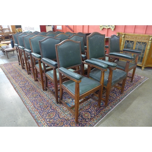 93 - A set of eighteen Arts and Crafts oak library chairs, made by Chamberlain, King & Jones Ltd.