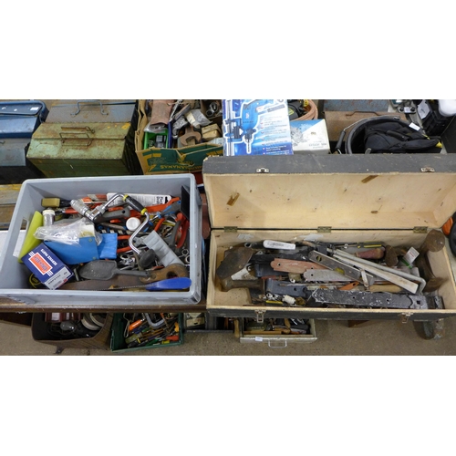 2031 - Two boxes of tools including saws, basin wrench, tape measures and more