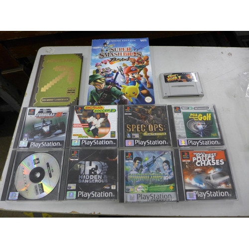 2116 - Eight Playstation 1 games with SNES Streetfighter 2 and books, Minecraft, etc.