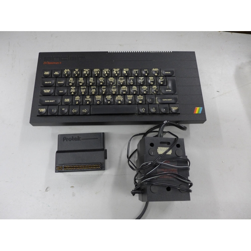 2127 - Sinclair ZX Spectrum vintage computer with joy stick and approximately 30 games