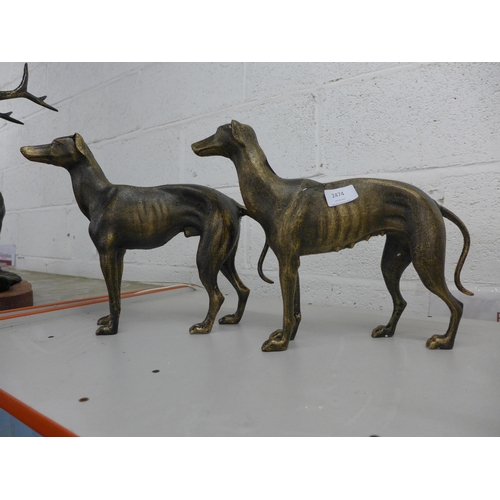 2474 - Pair of cast greyhound figures * this lot is subject to VAT