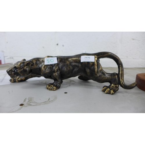 2476 - Cast lion figure * this lot is subject to VAT