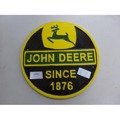 2491 - John Deere wall plaque * this lot is subject to VAT