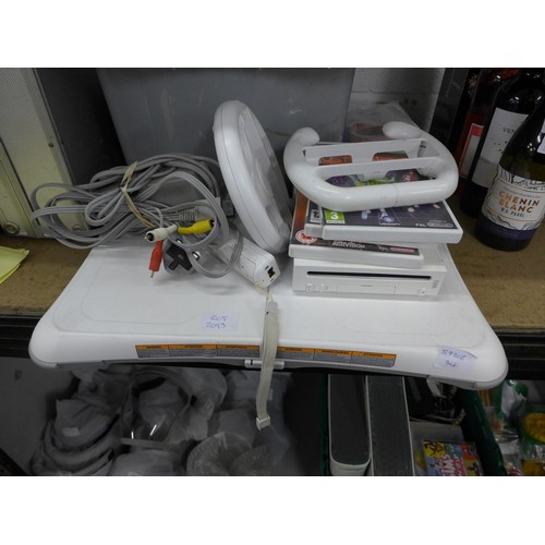 2093 - Wii board, wheel, games and cables