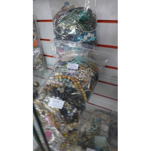 2129 - 2 bags of costume jewelry