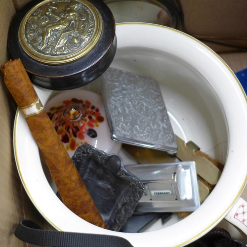 1166 - A box of assorted items including two cameras, perpetual calendar, brass button cleaner and glasswar... 