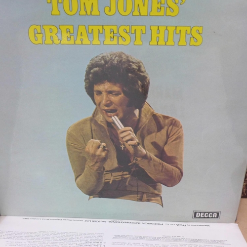 1169 - A collection of LP records and singles including ABBA, Boney M, Elvis Presley, Tom Jones and The Bea... 