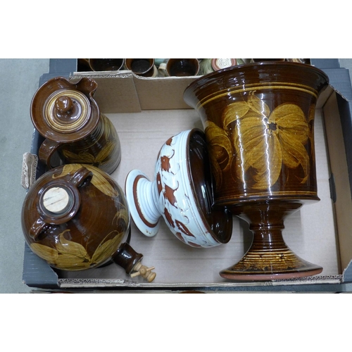 1170 - A large collection of Skegness pottery, includes a large urn, table lamp, flagon, oven wares, vase, ... 