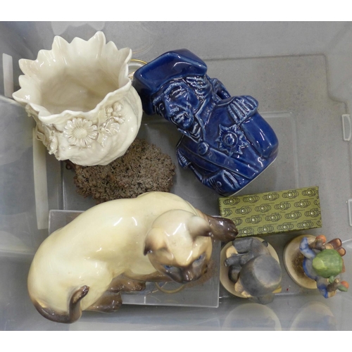 1173 - A Beswick Siamese cat, two Hummel figures, a box of mixed china with Royal Doulton series ware plate... 