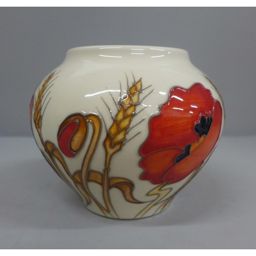 602 - A Moorcroft Harvest Poppy vase designed by Emma Bossons, 10.5cm