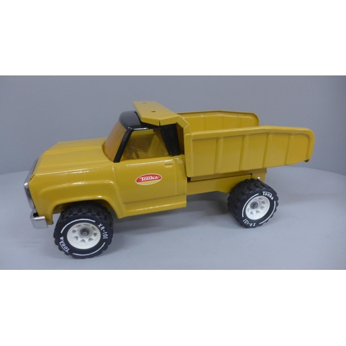 614 - A 1970's Tonka pressed steel Dodge truck, powder coated in ochre