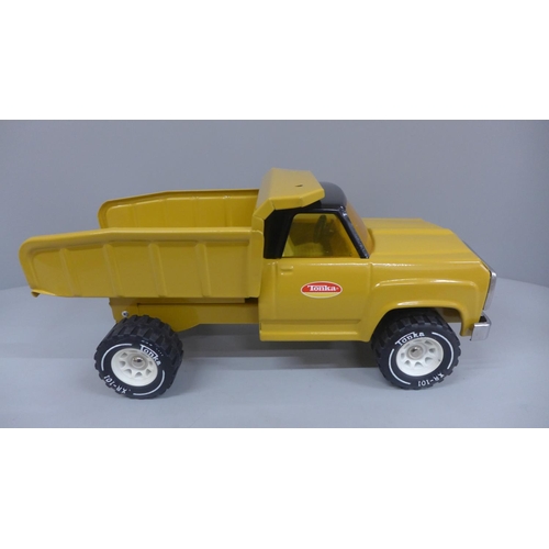 614 - A 1970's Tonka pressed steel Dodge truck, powder coated in ochre