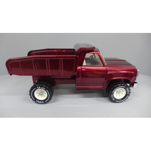 615 - A 1970's Tonka pressed steel Dodge truck, powder coated in deep cherry