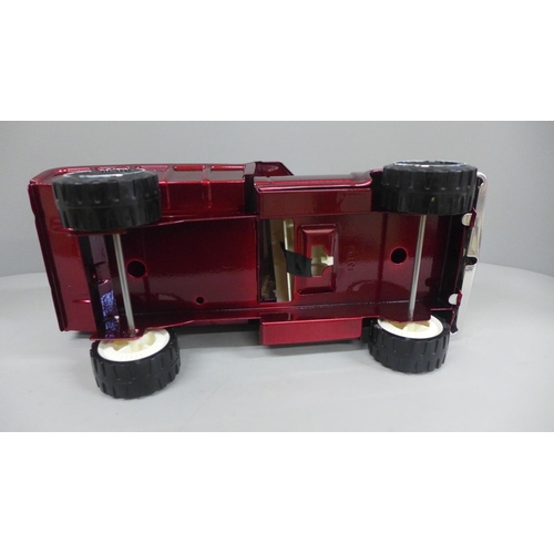 615 - A 1970's Tonka pressed steel Dodge truck, powder coated in deep cherry