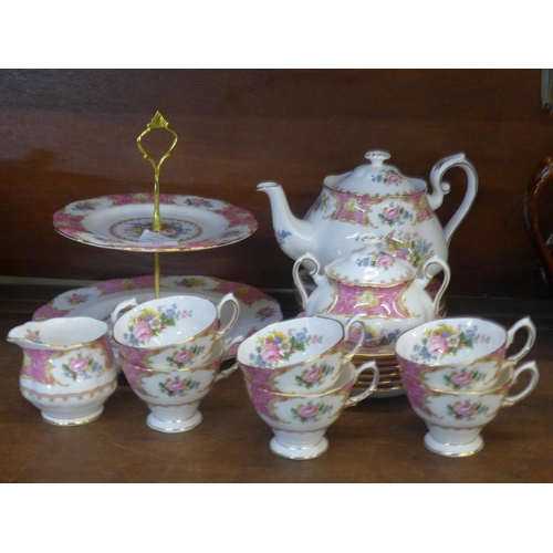 661 - A Royal Albert Lady Carlyle six setting tea service, six cups, saucers, side plates, teapot, sugar a... 