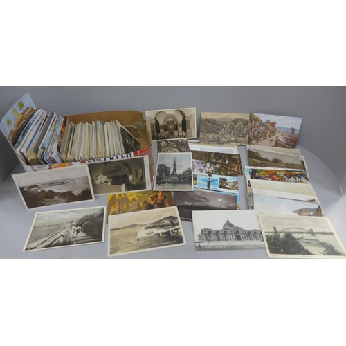 678 - Postcards; a box of postcards, vintage to modern