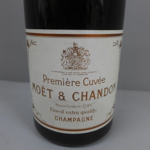 692 - A bottle of Moet and Chandon champagne