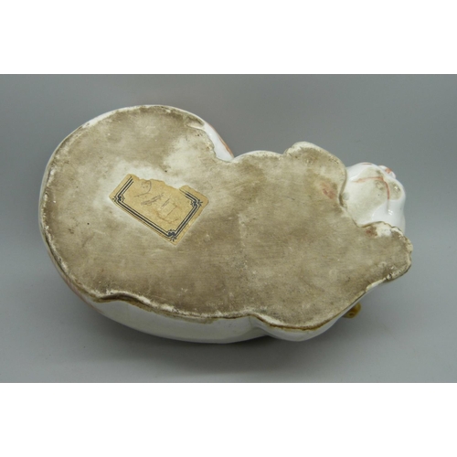 707 - A Japanese Taisho period Kutani porcelain model of a sleeping cat, 15.5cm