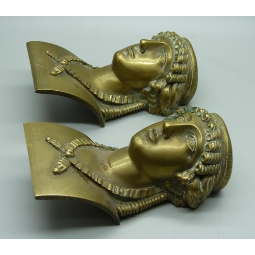 709 - A pair of gilt brass ormolu neo-classical head brackets