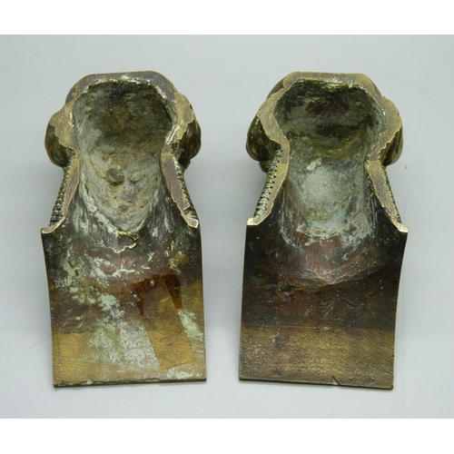 709 - A pair of gilt brass ormolu neo-classical head brackets