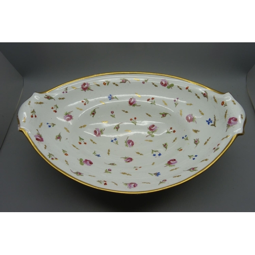 711 - An 18th/19th Century ovoid porcelain fruit bowl, decorated with flowers, some loss of gilding, 31cm