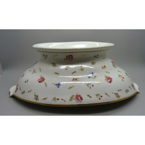 711 - An 18th/19th Century ovoid porcelain fruit bowl, decorated with flowers, some loss of gilding, 31cm