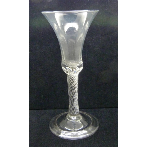 726 - An 18th Century air twist goblet, circa 1740, the air twist extending into the solid base of the tru... 