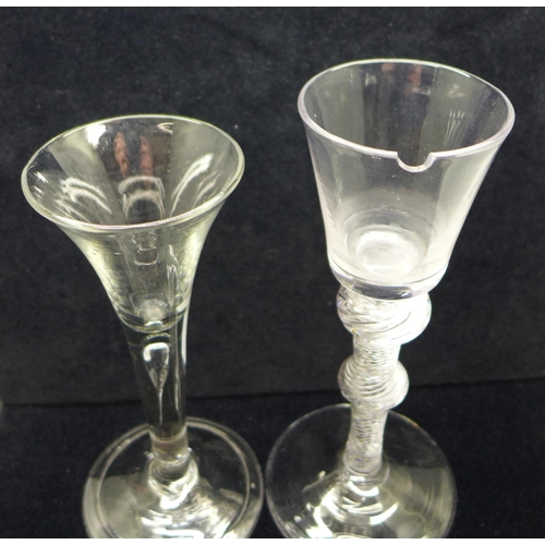 738 - An 18th Century wine glass having a bucket bowl with solid base over a double air twist knopped stem... 