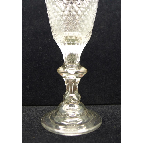 740 - An 18th Century wine glass, circa 1720, with hammered conical bowl over a teared baluster knop stem ... 