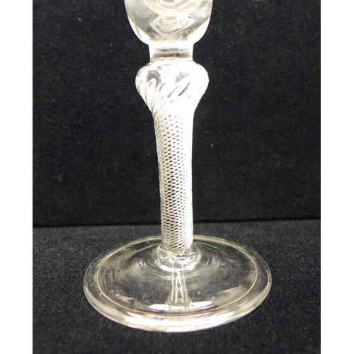 743 - An 18th Century wine glass, circa 1750, having a bell bowl with solid base over a shoulder knop air ... 