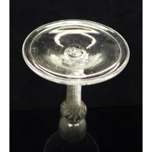 743 - An 18th Century wine glass, circa 1750, having a bell bowl with solid base over a shoulder knop air ... 