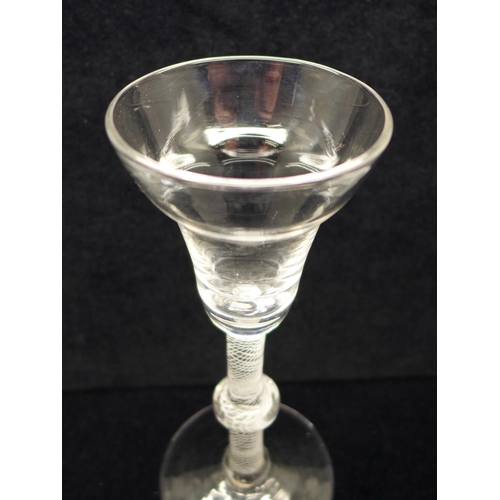 748 - An 18th Century wine glass, circa 1770, with pan topped bowl over a single series opaque gauze stem ... 