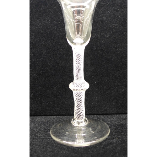 748 - An 18th Century wine glass, circa 1770, with pan topped bowl over a single series opaque gauze stem ... 