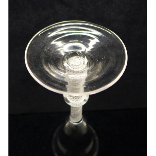 748 - An 18th Century wine glass, circa 1770, with pan topped bowl over a single series opaque gauze stem ... 