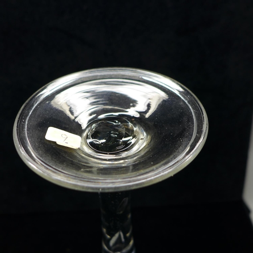 755 - A wine glass, circa 1750, trumpet bowl over tiered stem over folded foot, 17.5cm with wine glass, ci... 