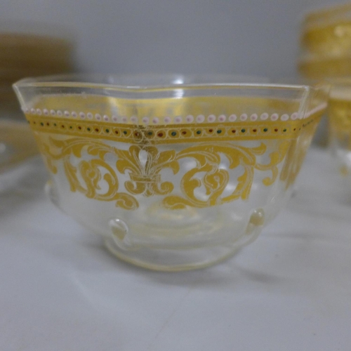 763 - A 19th Century set of eleven Venetian finger bowls and stands with gilded and enamel decoration