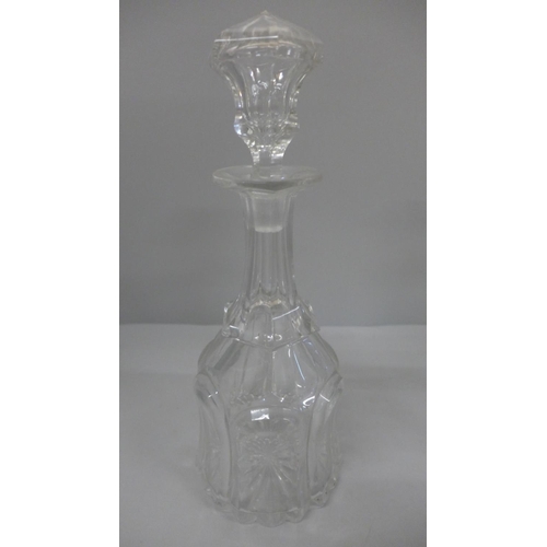 790 - A pair of 19th Century bell shaped crystal decanters, one with silver whisky label