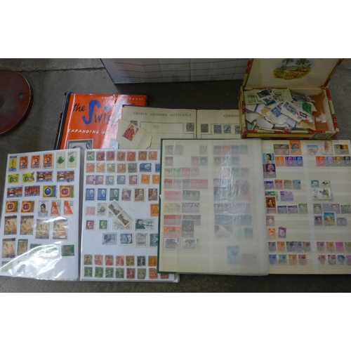 792 - Stamps; a box of stamps, covers, etc., loose and in albums