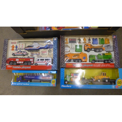 808 - A box of die-cast model vehicles including Corgi trucks and lorries, boxed