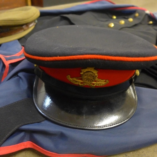 860 - A Royal Artillery military uniform and three caps