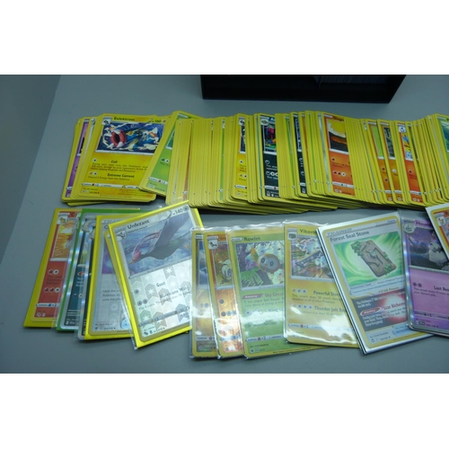 874 - 420 Pokemon cards including 20 holos and black star rare