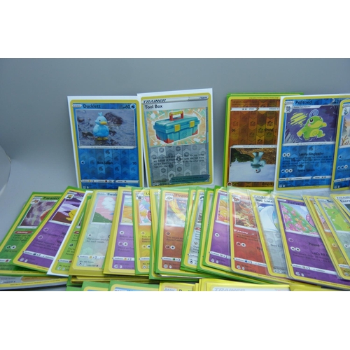 879 - 125 Holo and reverse holo Pokemon cards in protective sleeves including black star rares