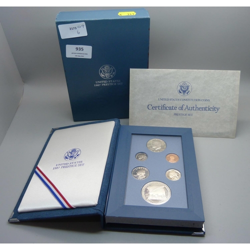 935 - A 1987 United States Prestige coin set, including a 900 silver 1 dollar