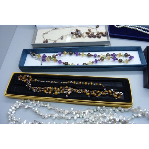 952 - Silver mounted gemstone necklaces including amethyst, pearl, tigers eye, etc.