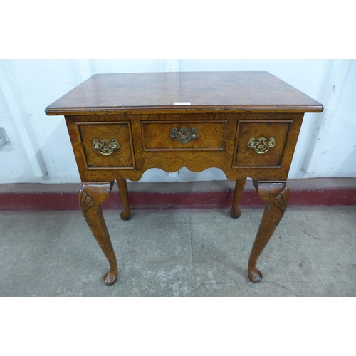 217 - A George I style burr elm lowboy