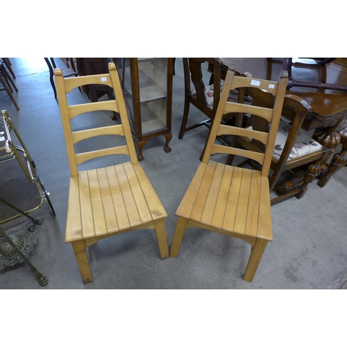 258B - A pair of Arts and Crafts beech side chairs