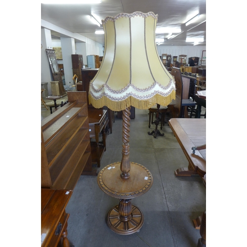 260 - A French carved beech barleytwist standard lamp